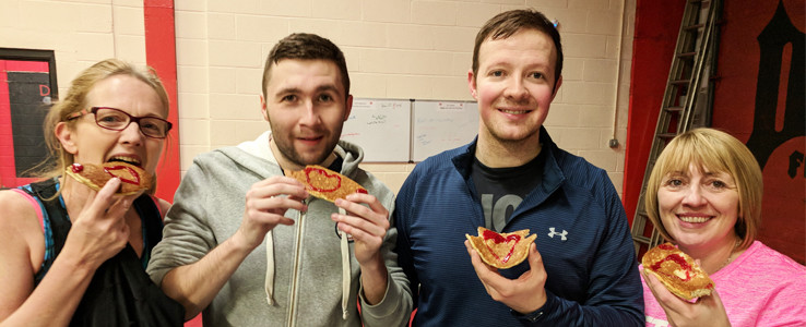 4 DCS members eating our raspberry jam topped protein pancakes